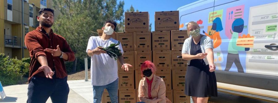 2 of 6, Four Food Recovery Network staff posing with produce